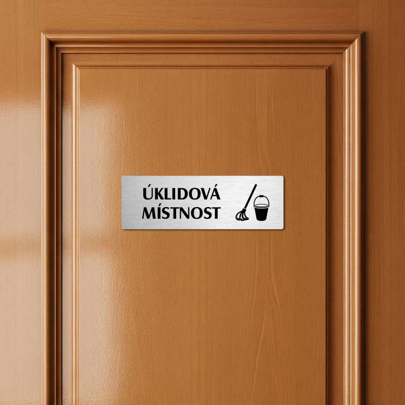 Úklidová místnost, 240x79mm, zlatá popiska s okrasným rámečkem  